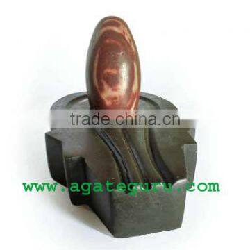 Narmada Shiva Lingam with Black Stone Base : Wholesale Gemstone Narmada Shiva Lingam