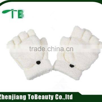 white knitted fingerless gloves