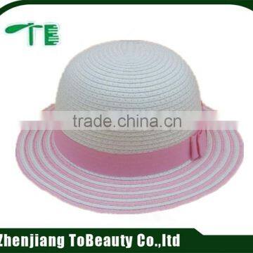 white and pink children straw hat with tape