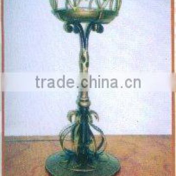 graceful wrought iron candlestick