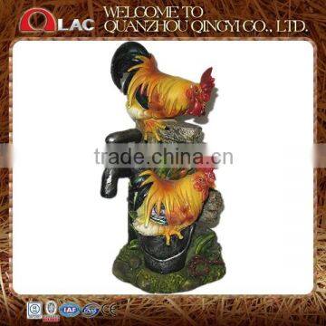 resin two roosters beside water tap statue garden decoration