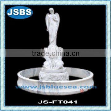 white stone angel water fountain outdoor