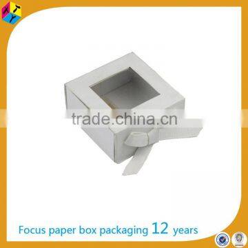 small white cardboard clear top gift boxes