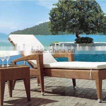 Rattan sun lounge with tea table