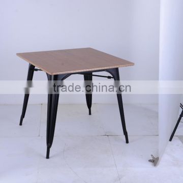 xavier pauchard dining table with wooden top for dining room