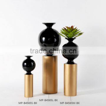 Luxury golden with black resin vases decorating home accessories