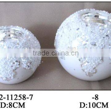 clear and white glass round tealight holders