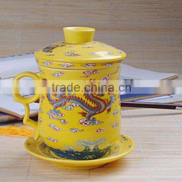 yellow marigold porcelain cup and saucer with insert strainer