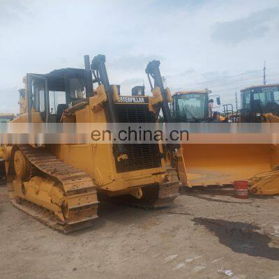 Loading service for Caterpillar D7 crawler excavator , Caterpillar D7R loading by flat