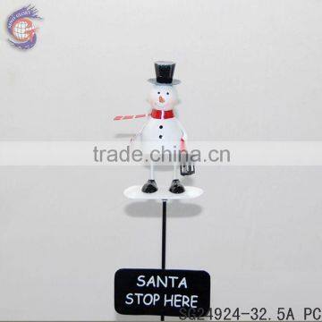 christmas snowman stick of garden decoration with stop sign