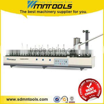 Wood profile wrapping machine