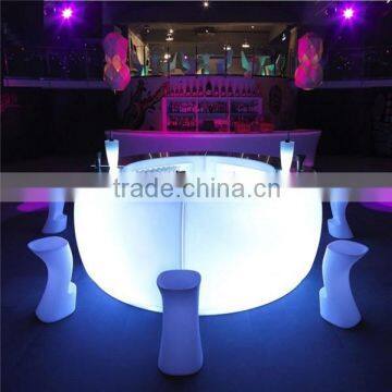 modern garden and outdoor bar counter with illuminated LED stool