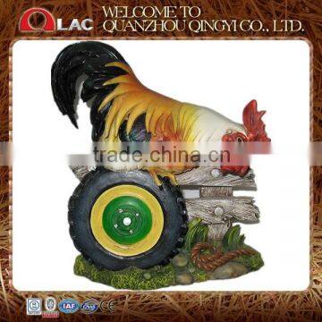 customized resin decorative rooster on wheel garden ornament