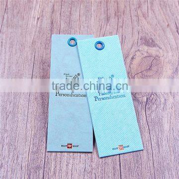 Vintage printed luggage hang tag labels with brass eyelet