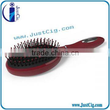 Promotional plastic with easy clean hair brush