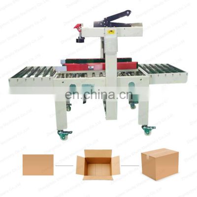 Automatic mineral water bottle carton post 1-12 carton box tape sealing machine