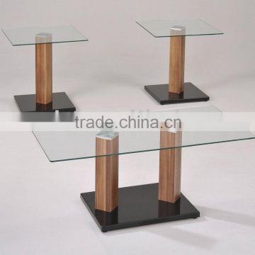 Glass modern coffee table with wooden legs