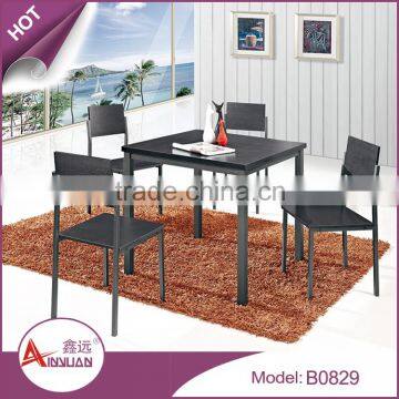 Foshan imported cheap 4 seater indoor space saving wooden black square dubai dining tables and chairs for dining room