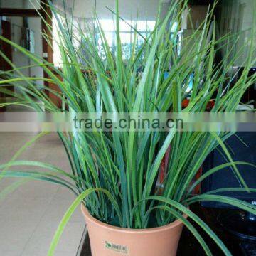 Artificial cogongrass artificial bush potted in plastic planter