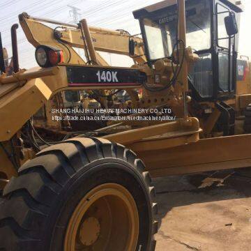 Использованный мотоградар Caterpillar 140K с рыхлителем photo-2