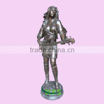 Metal playing guitar figure