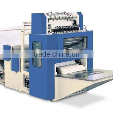 Facial tissue folding machine