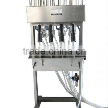 Four heads vacuum liquid filling machine