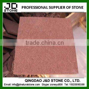 bush hammered red sandstone tile