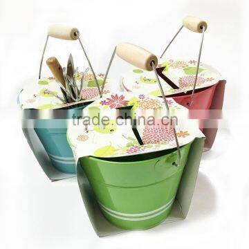 round white oil tin pail with lid