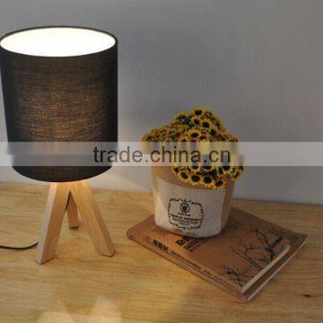 wood base table lamp with color fabric lamp shade