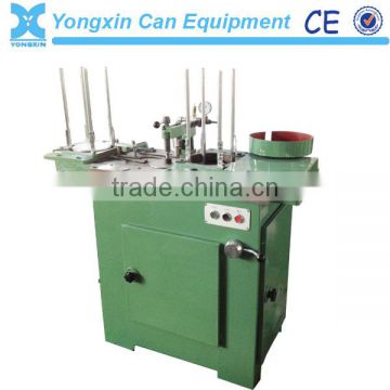 Paint tin can cover glue filling machine