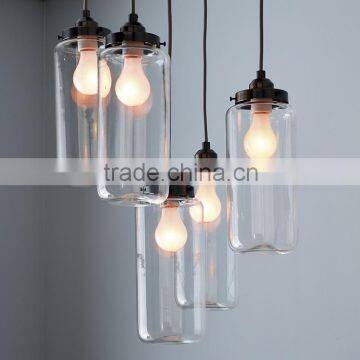 11.29-8 Light preserves Antique Bronze 5-Jar Glass Chandelier casts a soft glow Hung above tables, counters or in hallways