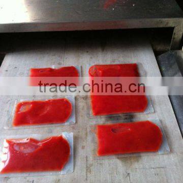 Industrial microwave machinery for sterilizing tomato paste