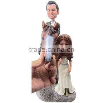 Polyresin customized lover riding for dating bobble head