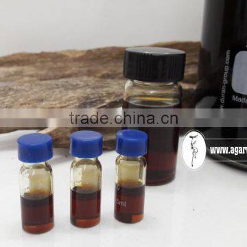 Agarwood or Aloeswwood viscous liquid essential oil made from rich dark resin Oud wood ingredients - awesome sweet