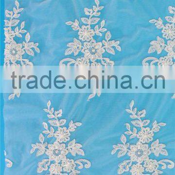 China Dongguan factory direct import fancy beaded cord lace fabric