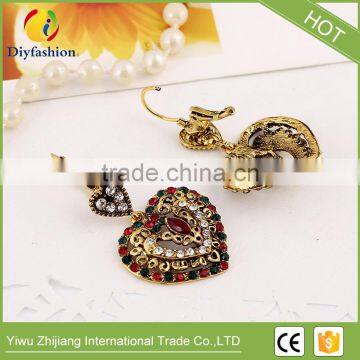 Retro Bohemian Dirr Heart-shaped Resin Gold Plated Ear Clip photo-3