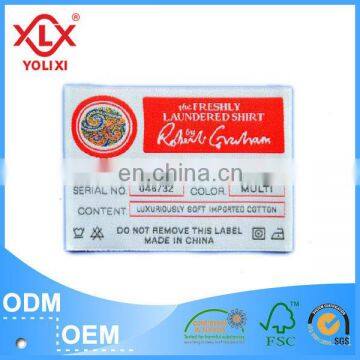 Fire retardant woven label for fashion garment