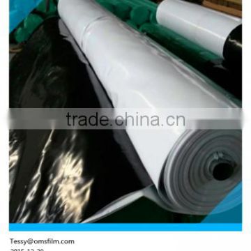 White black reinforced poly tarp