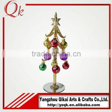 hanging ornaments decorated glass christmas tree