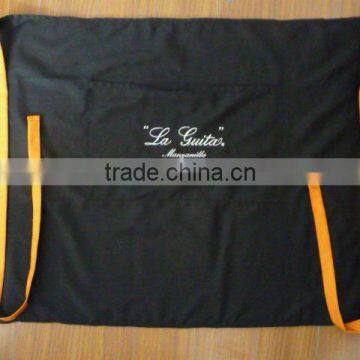 black cotton semi-apron with orange tape