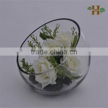 Handmade oblique opening round clear glass jar