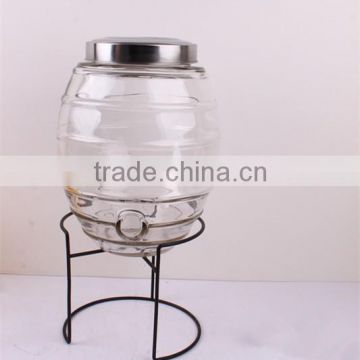 clear glass barrel with metal rack