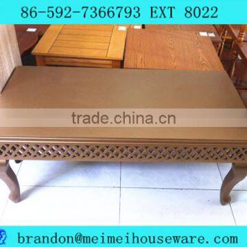 golden carved wooden coffee table