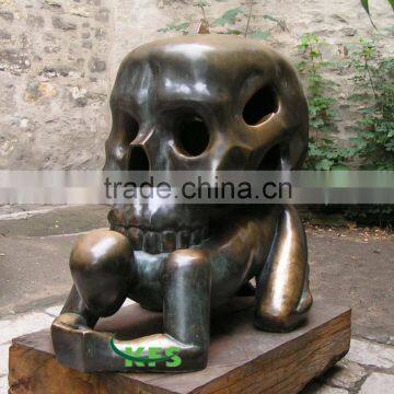 Bronze abstract skull sculpture