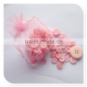 Assorted sizes pink buttons for kids handicraft making and decoration