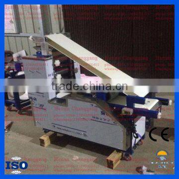 Automatic dumpling wrapper forming machine