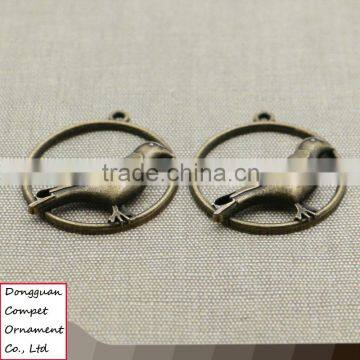 Wholesale Metal Plating Zinc Alloy Hollow Out Cuckoo Bird Pendant photo-3