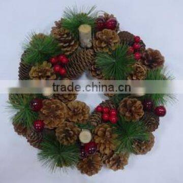 pine needle Xmas wreath with berries and cones decorations