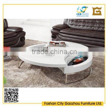 irregular shaped swivel coffee table wood top metal base with storage